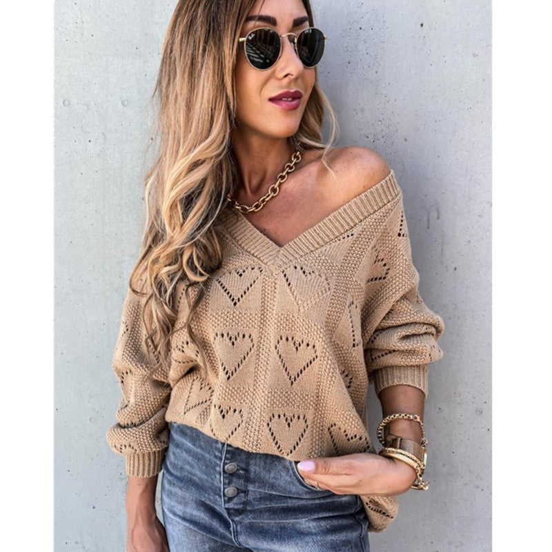 Woman’s solid color hollow loose knit sweater