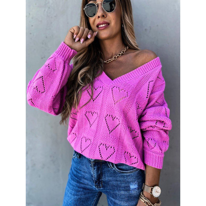 Woman’s solid color hollow loose knit sweater