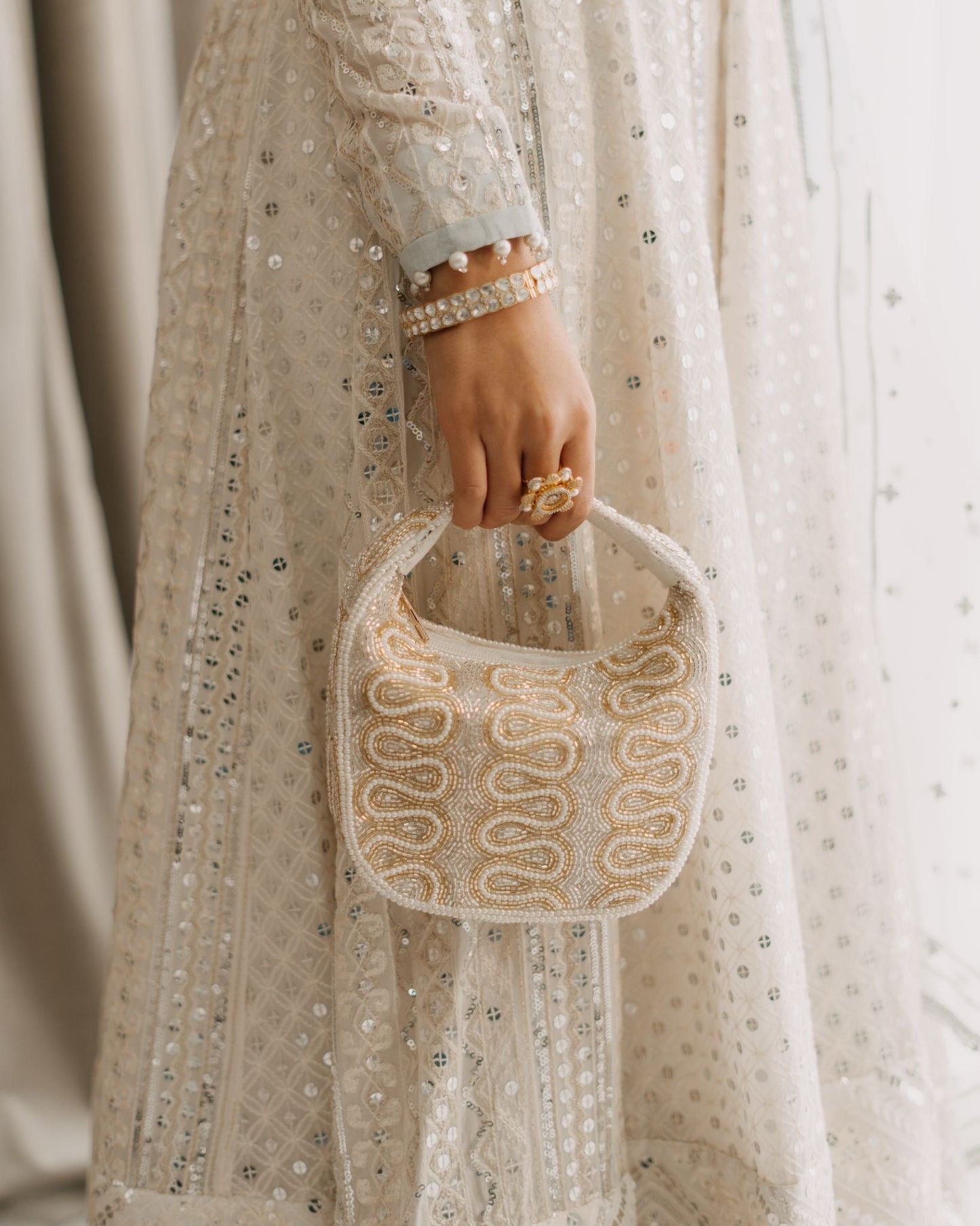 The Ivory Opulence Bag